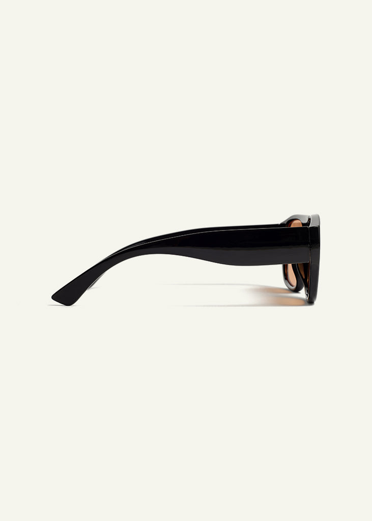 sybaria; sybaria sunglasses; BESANA sunglasses (BLACK & MANGO); Oversized; Oversized luxury; premium unisex eyewear; ultralight polycarbonate eyewear; Mango UV400 lenses; high fashion eyewear; chromotherapy eyewear;
