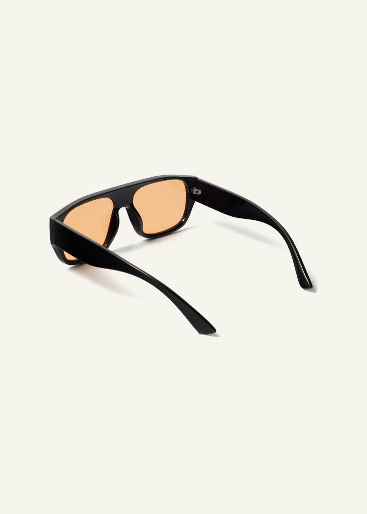 sybaria; sybaria sunglasses; BESANA sunglasses (BLACK & MANGO); Oversized; Oversized luxury; premium unisex eyewear; ultralight polycarbonate eyewear; Mango UV400 lenses; high fashion eyewear; chromotherapy eyewear;
